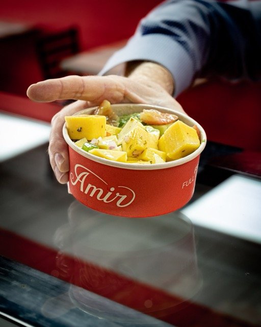 Amir food photography showing a fresh falafel.